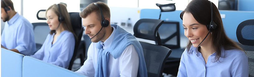 young-employee-working-with-headset-accompanied-by-her-team 1